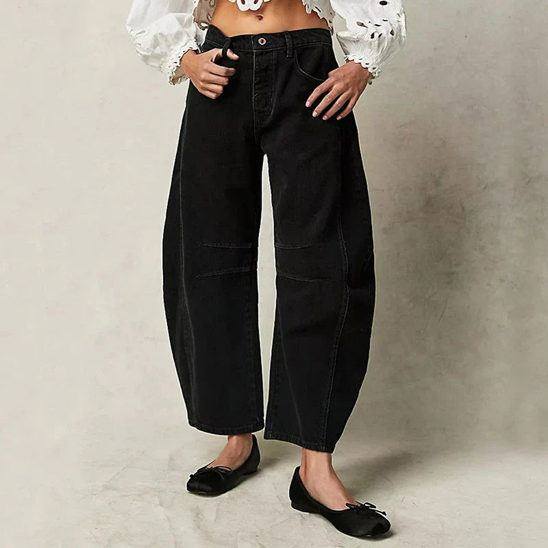 Trendha wide-leg summer pants in light blue, white, and black colors with a relaxed, stylish design