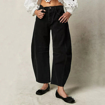 Trendha wide-leg summer pants in light blue, white, and black colors with a relaxed, stylish design