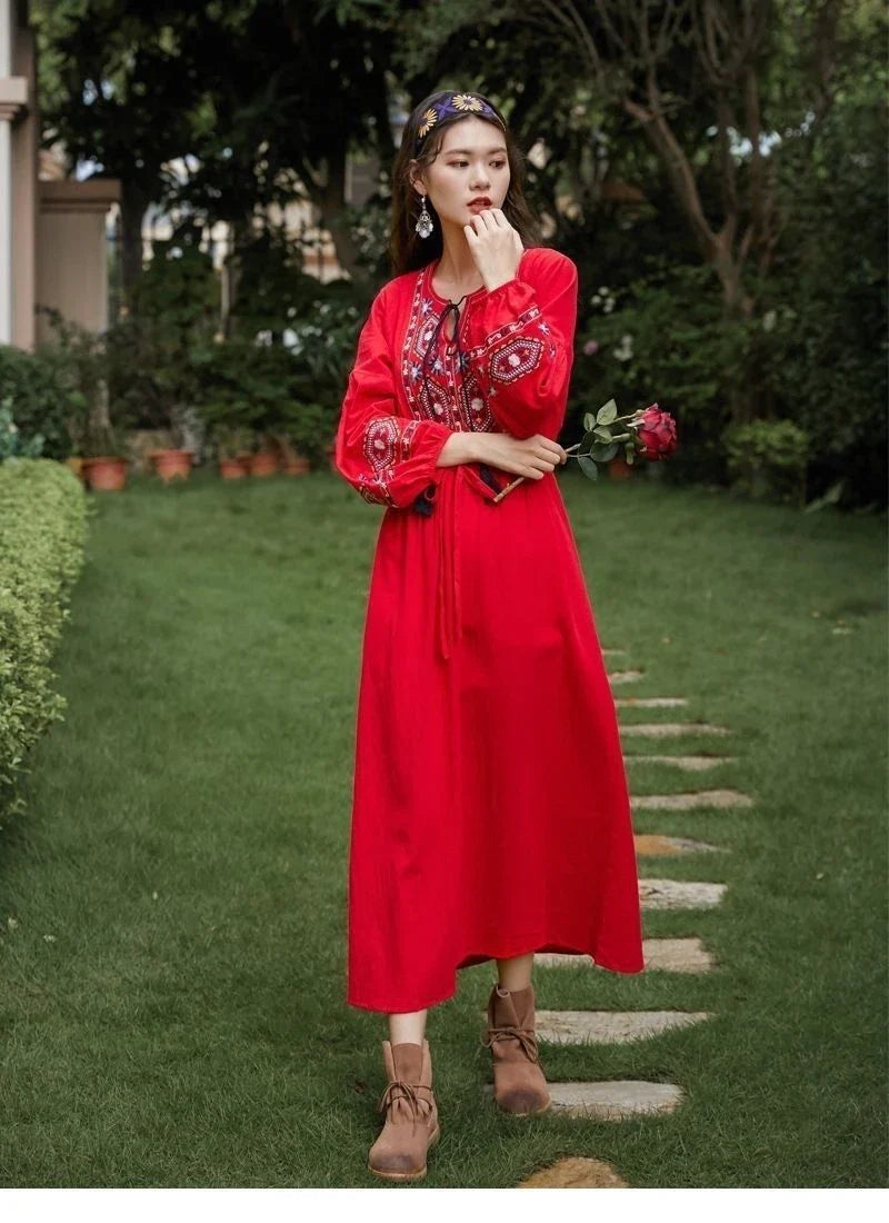 Elegant embroidered cotton-linen dress with tassels, featuring a waist-cinching A-line silhouette in vibrant colors