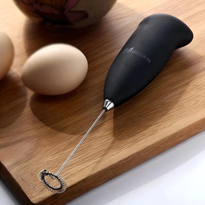 Portable electric milk frother and blender with sleek, ergonomic design and stainless steel mixing head