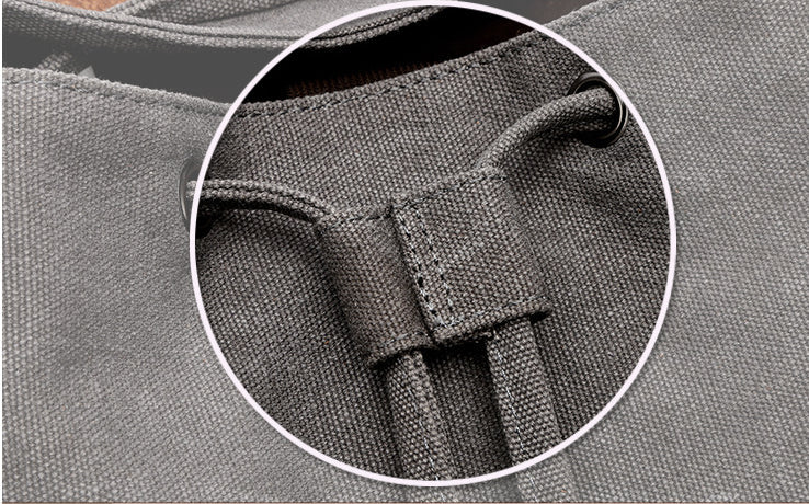 Durable canvas backpack with spacious 20-35L capacity, convenient draw-string closure, and unisex design for everyday use