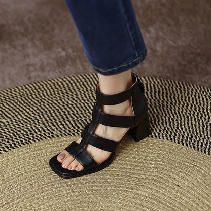 Premium leather gladiator sandals with square heel and adjustable buckle strap for stability and comfort