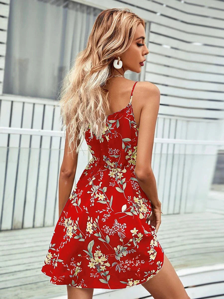 A stylish floral print suspender dress with an elastic waist, perfect for summer fashion and casual or dressy occasions.