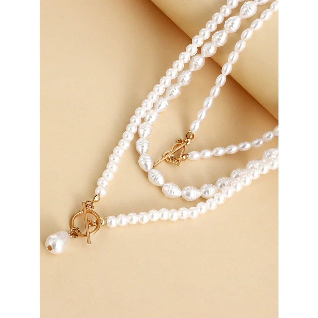 Elegant imitation pearl heart pendant necklace with lustrous bead chain and secure closure