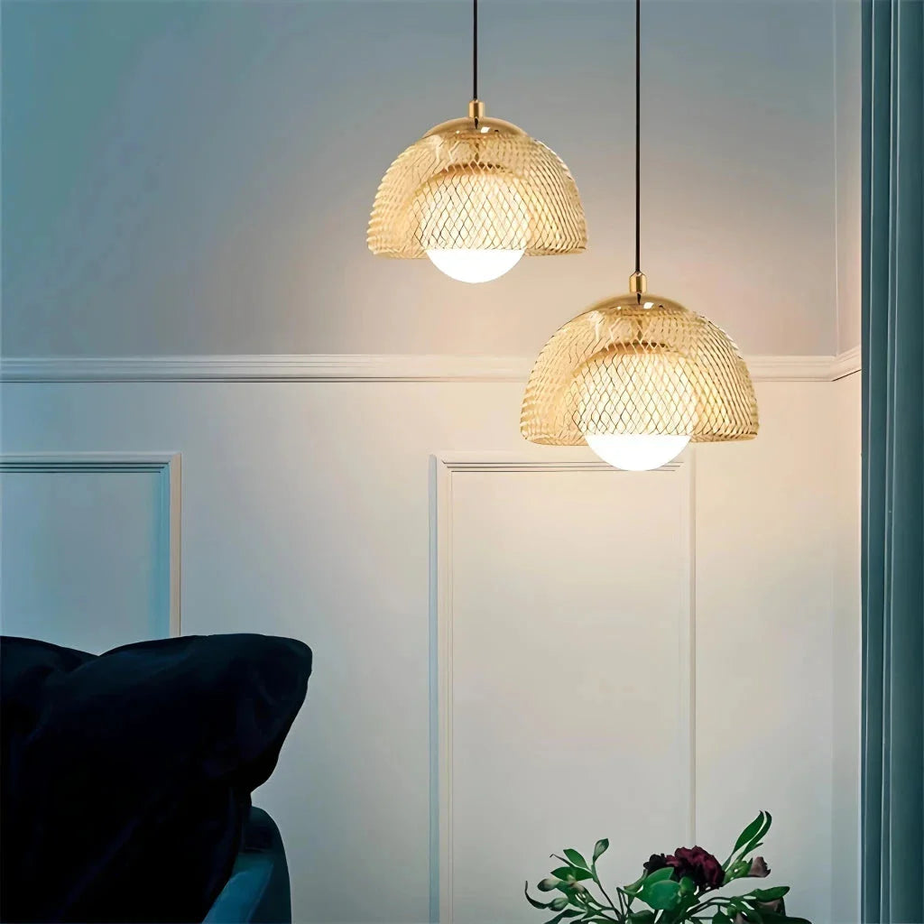 Elegant modern Nordic-style LED pendant light with polished copper finish and gold lampshade, providing focused and effective illumination for living spaces.