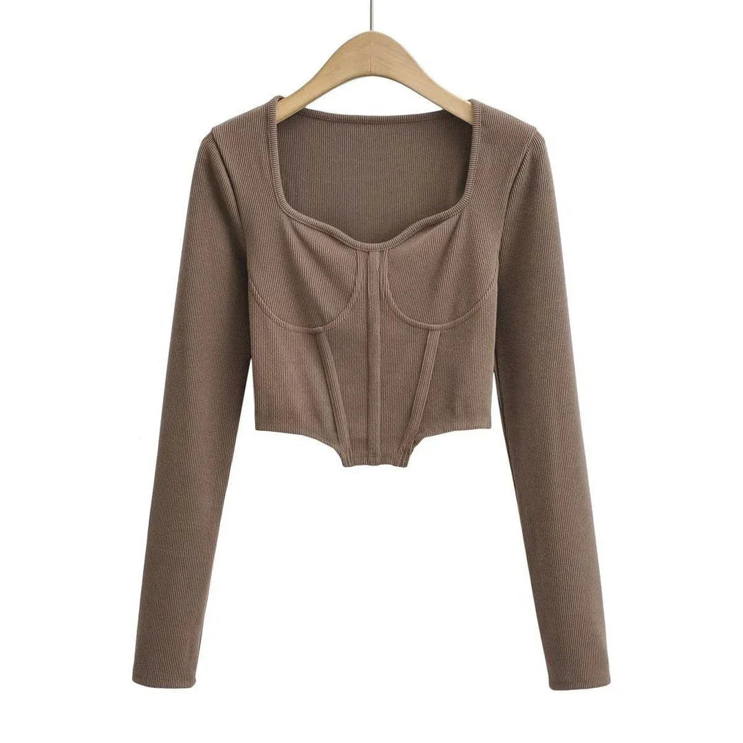 A stylish slim-fit short autumn top with an open waist design, made of premium polyester fabric with long sleeves and a square collar.
