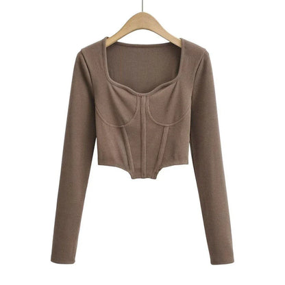 A stylish slim-fit short autumn top with an open waist design, made of premium polyester fabric with long sleeves and a square collar.