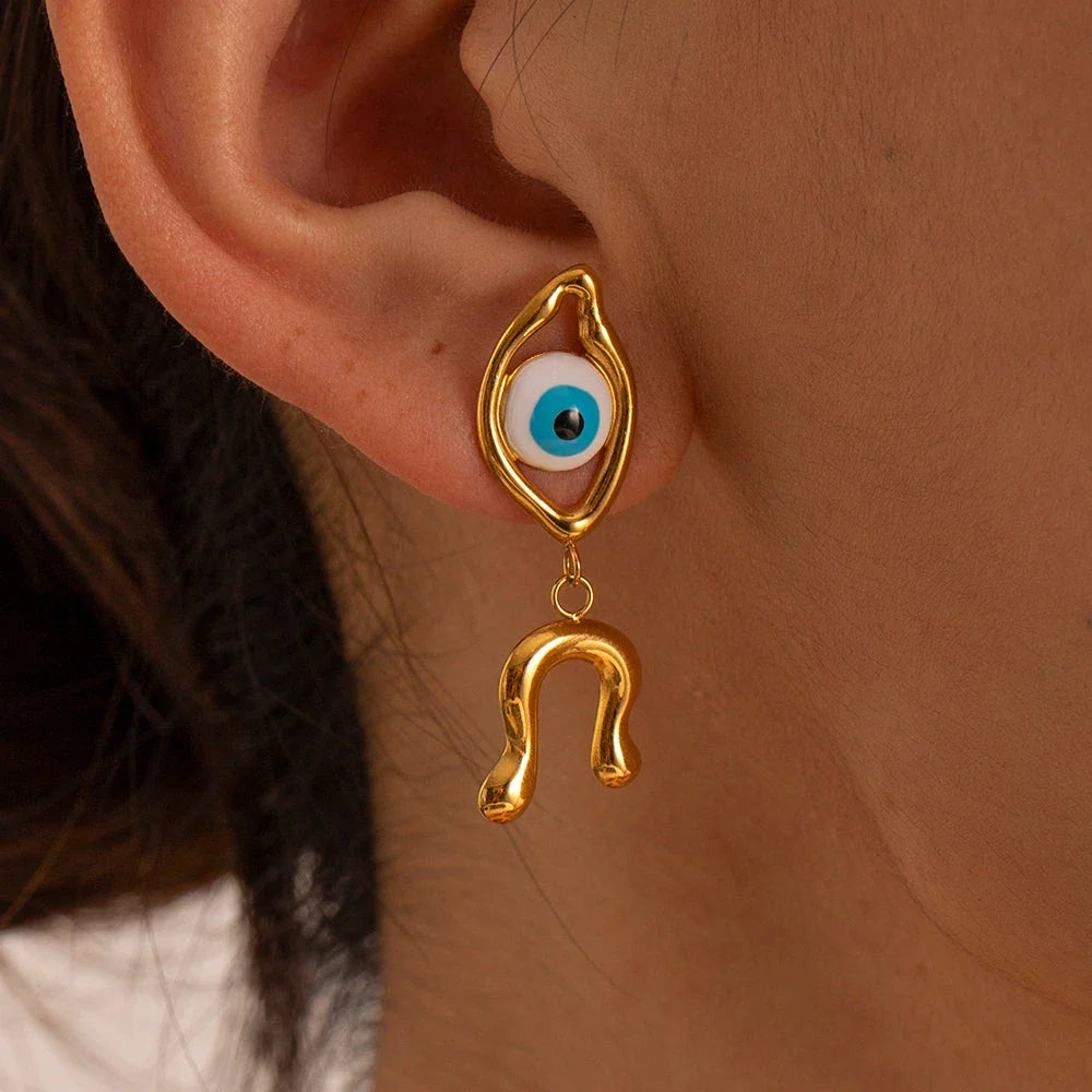 Pair of 18K gold plated stainless steel asymmetrical devil's eye earrings with a dripping oil finish