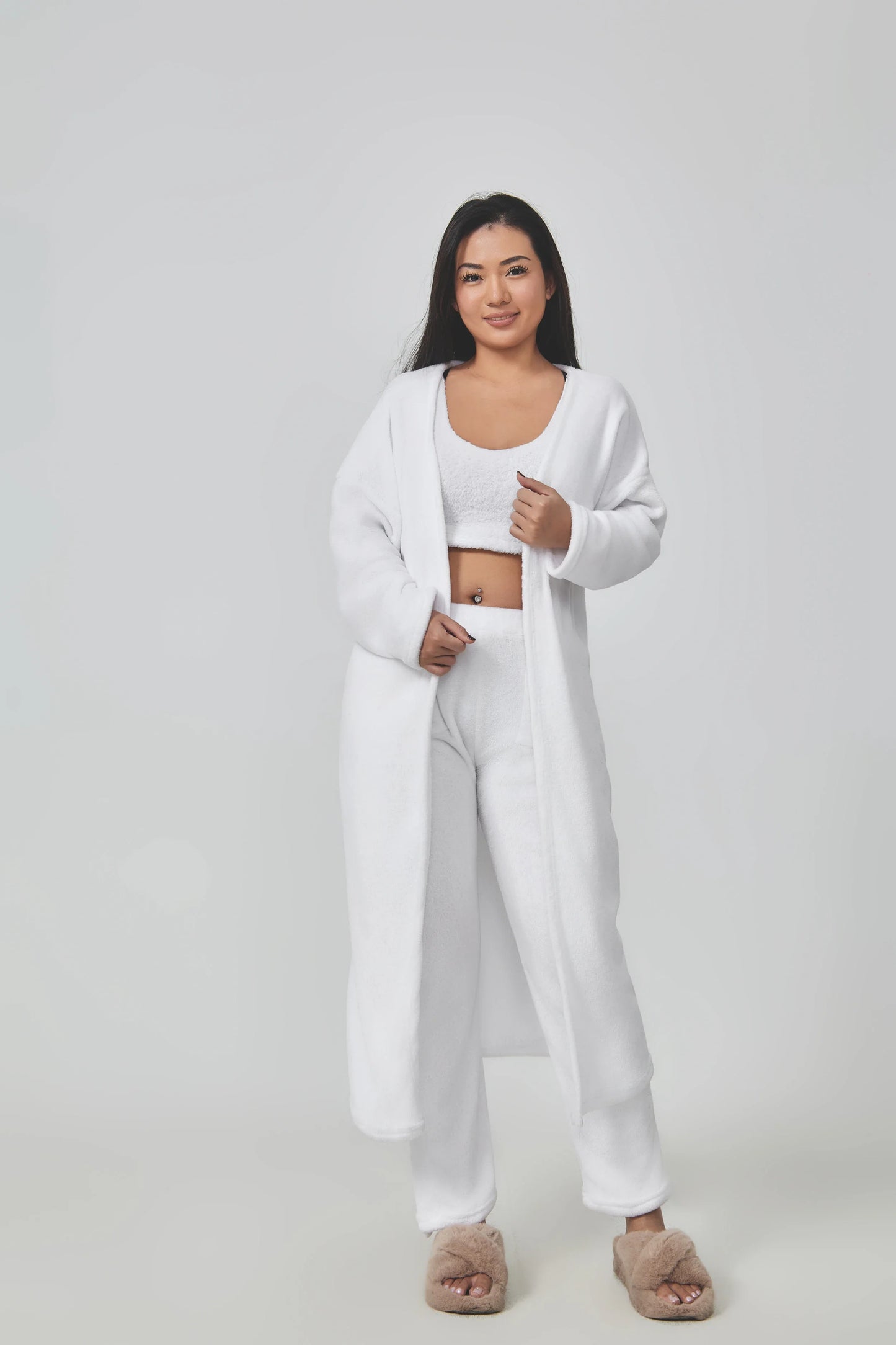 Cozy 3-piece loungewear set in pastel colors including crop top, wide-leg pants, and matching cardigan