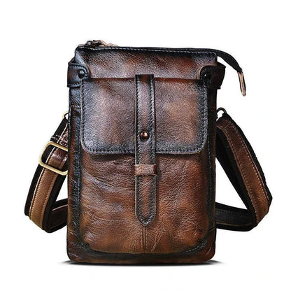 A premium cowhide leather shoulder bag with a compact and versatile design, suitable for various occasions and outdoor activities.