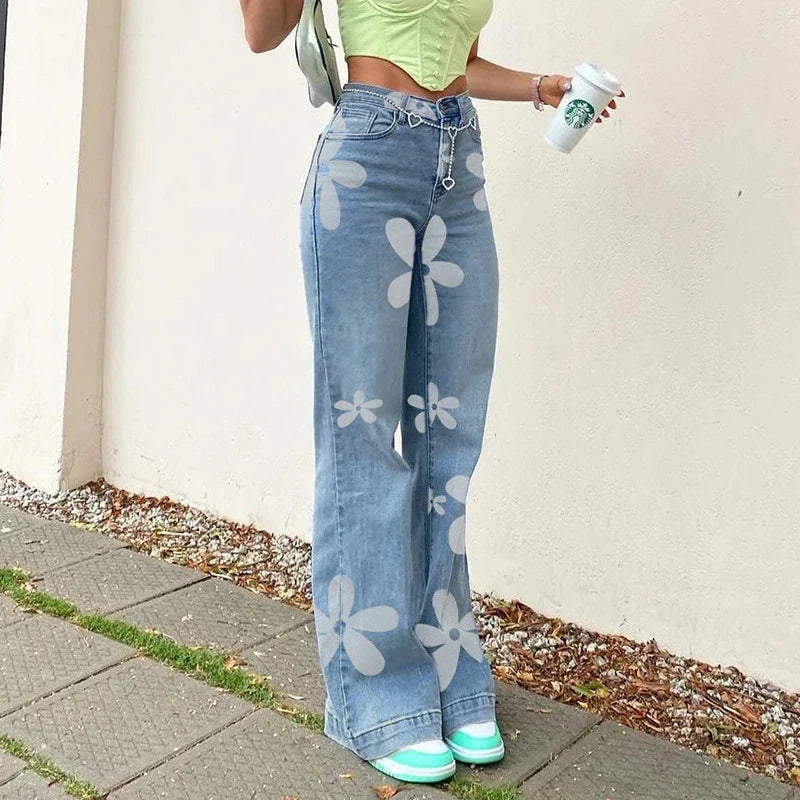 Stylish high-rise straight-leg jeans with a bold floral print, perfect for casual street-style fashion
