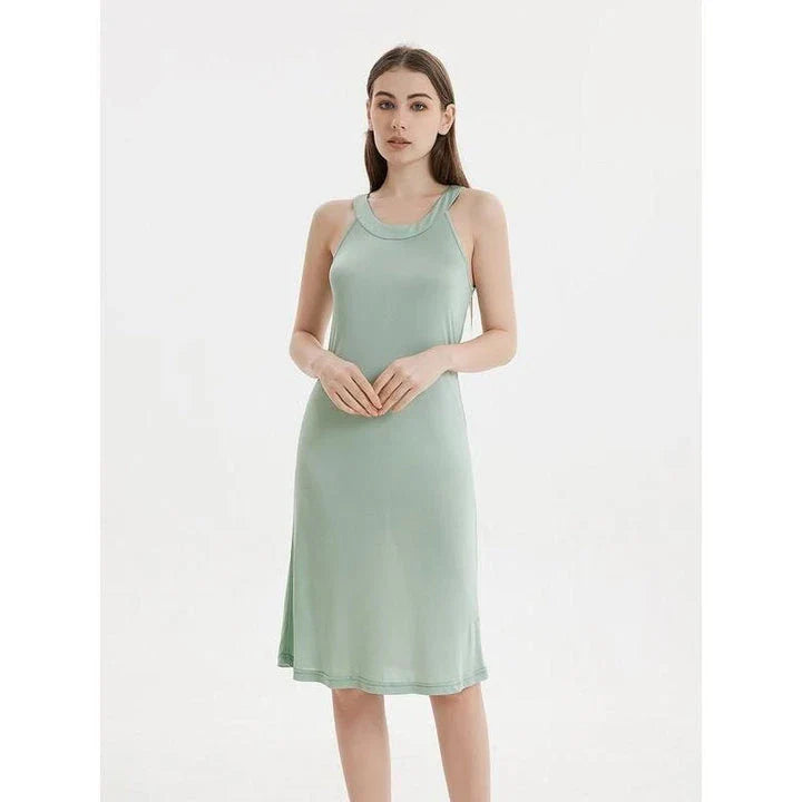 Elegant silk-blend halter neck midi dress in green and white colors, showcasing a chic and versatile design for modern American women.
