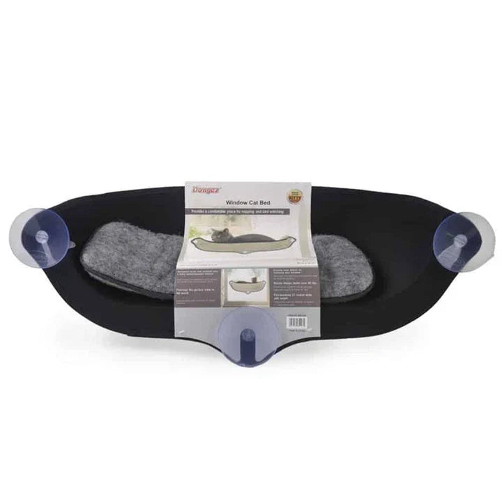 Cozy beige felt cat window hammock bed with plush mat, attached to window with suction cups