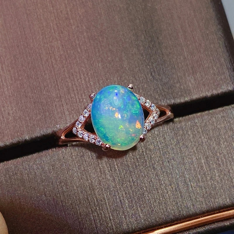 Elegant 925 silver ring featuring a captivating natural Australian opal with a mesmerizing play of colors