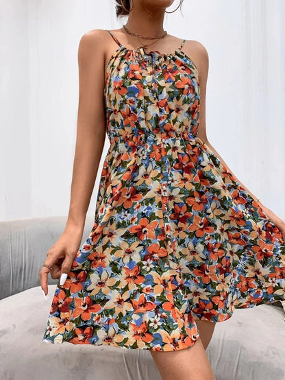 A stylish floral print suspender dress with an elastic waist, perfect for summer fashion and casual or dressy occasions.