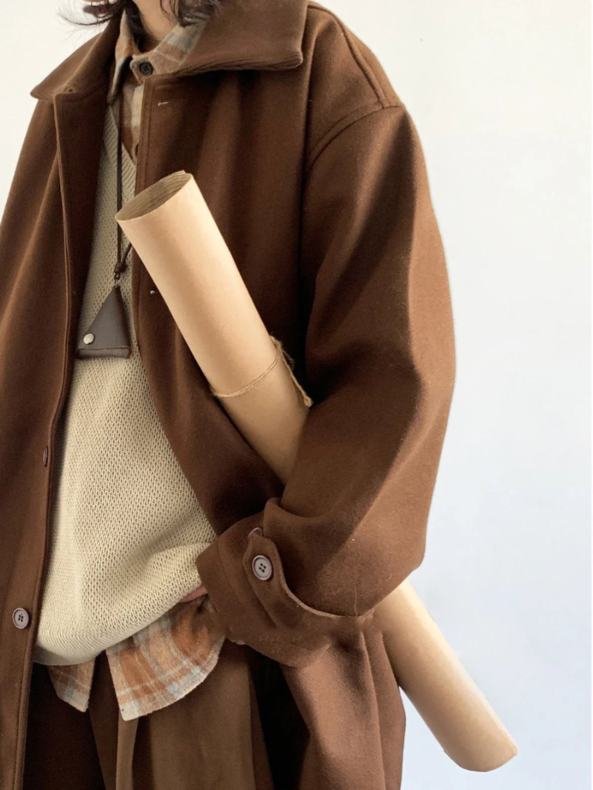 Premium Japanese-inspired retro wool coat in a classic brown color, featuring a single-breasted design and lapel collar for a polished look.