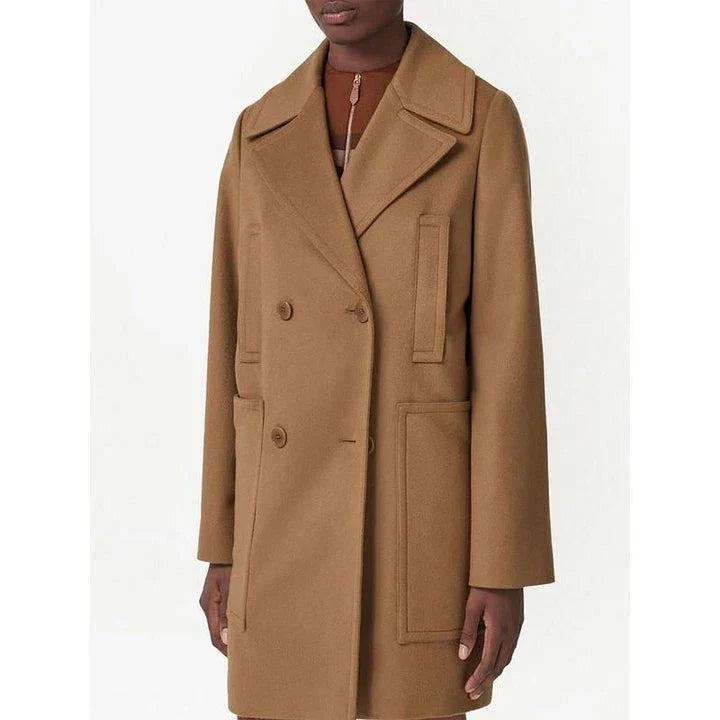 A stylish, mid-length double-breasted overcoat in a rich brown color, designed with a turn-down collar and practical patch pockets for a polished, versatile look.