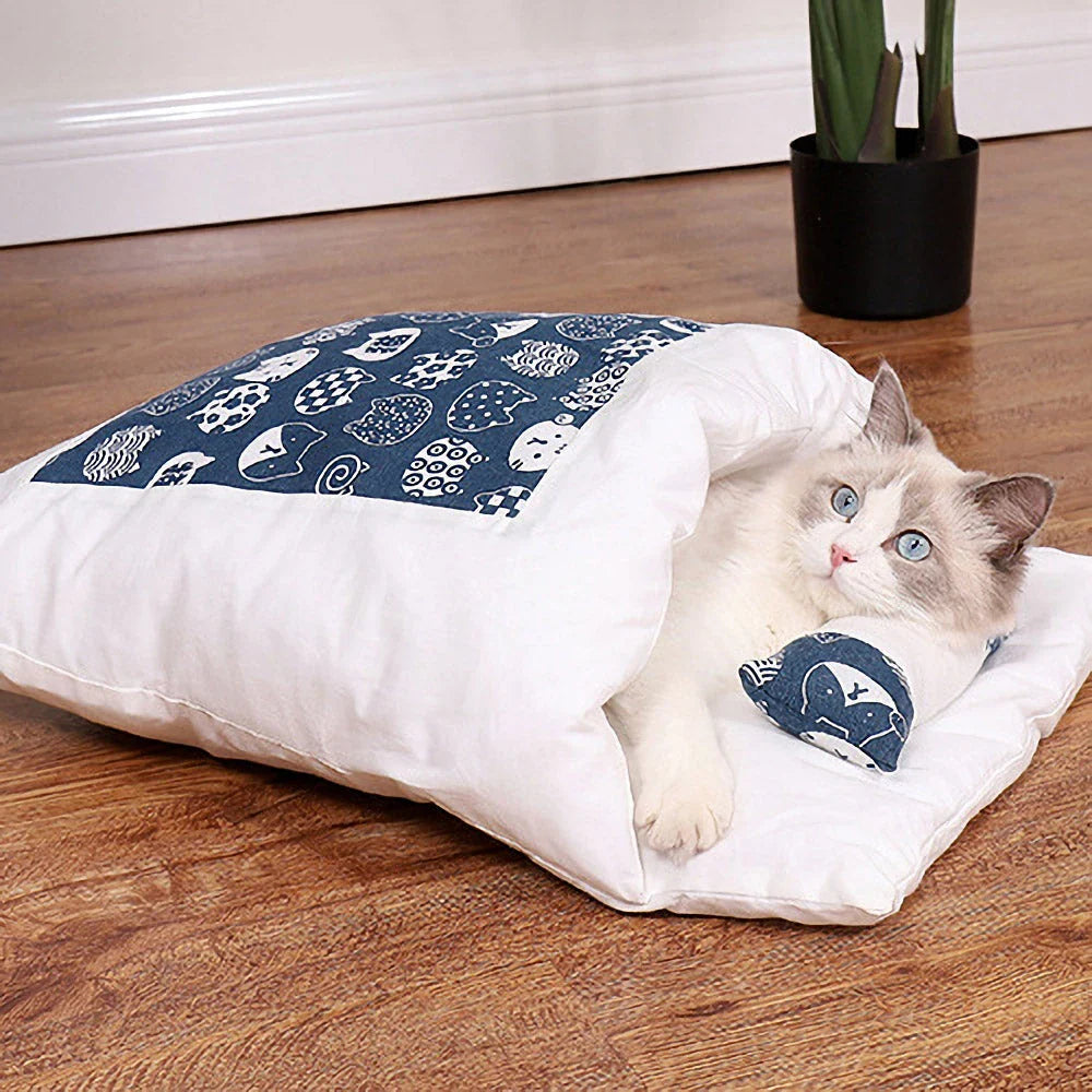 Cozy cat cave bed with a printed design, providing a plush and secure retreat for your feline friend.