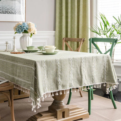 Elegant hollowed-out green tablecloth with a sophisticated and rustic design, perfect for American-style dining and events