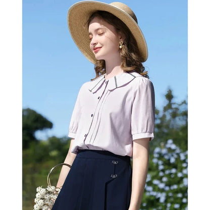 Stylish French Puff Sleeve Blouse with Classic Peter Pan Collar - A sophisticated and chic blouse for the modern, fashion-forward woman