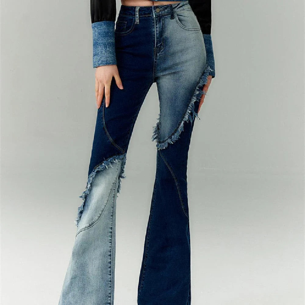 Geometric raw edge jeans with high-waisted, slimming design in blue denim