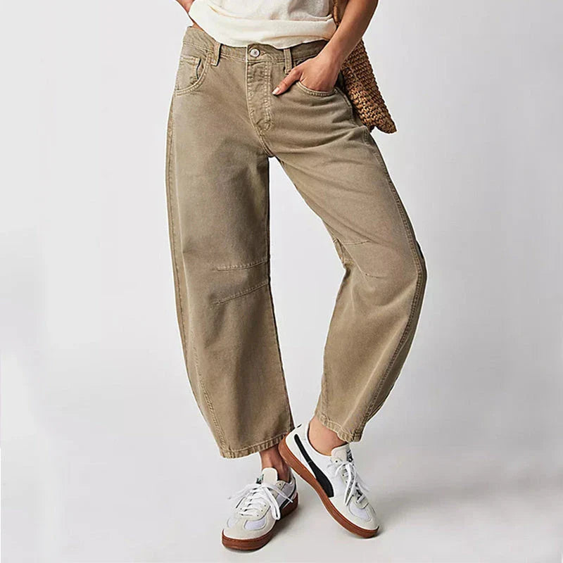 Trendha wide-leg summer pants in light blue, white, and black colors with a relaxed, stylish design