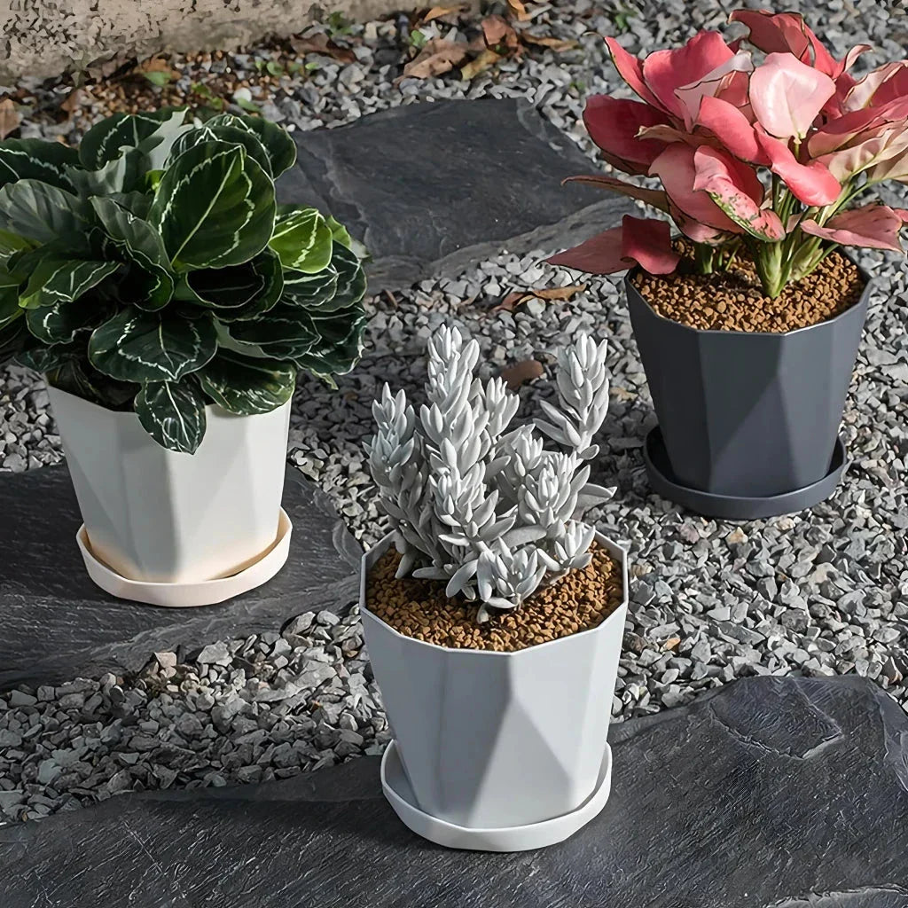 Elegant Nordic-style resin flower pot with a minimalist design, perfect for displaying indoor plants and adding a touch of Scandinavian charm to any room.