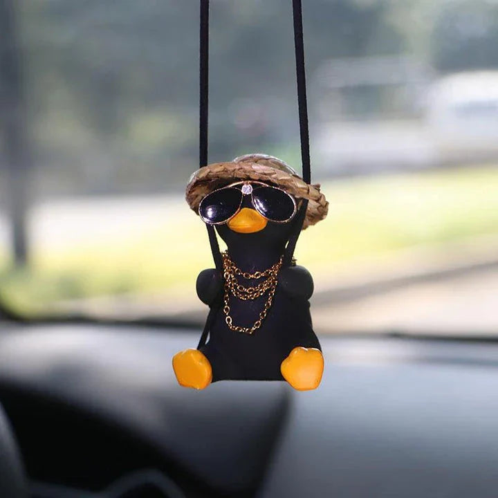 Cute swinging duck car pendant with a guitar and coke-themed design, adding a touch of personality to your vehicle