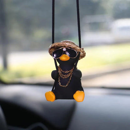 Cute swinging duck car pendant with a guitar and coke-themed design, adding a touch of personality to your vehicle