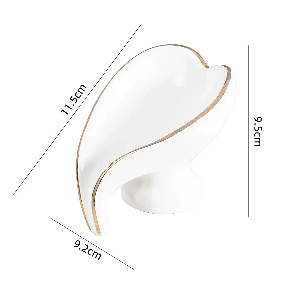Elegant ceramic leaf-shaped soap dish with a heart design, perfect for adding a touch of nature-inspired luxury to your bathroom decor