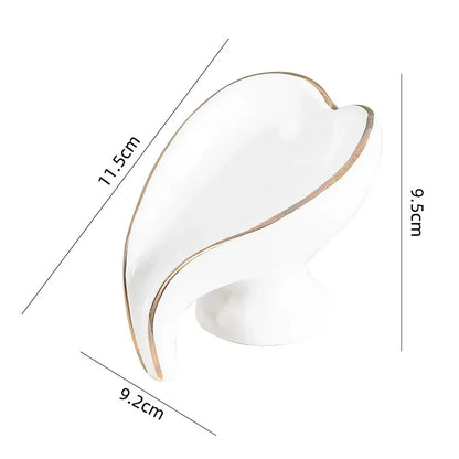 Elegant ceramic leaf-shaped soap dish with a heart design, perfect for adding a touch of nature-inspired luxury to your bathroom decor