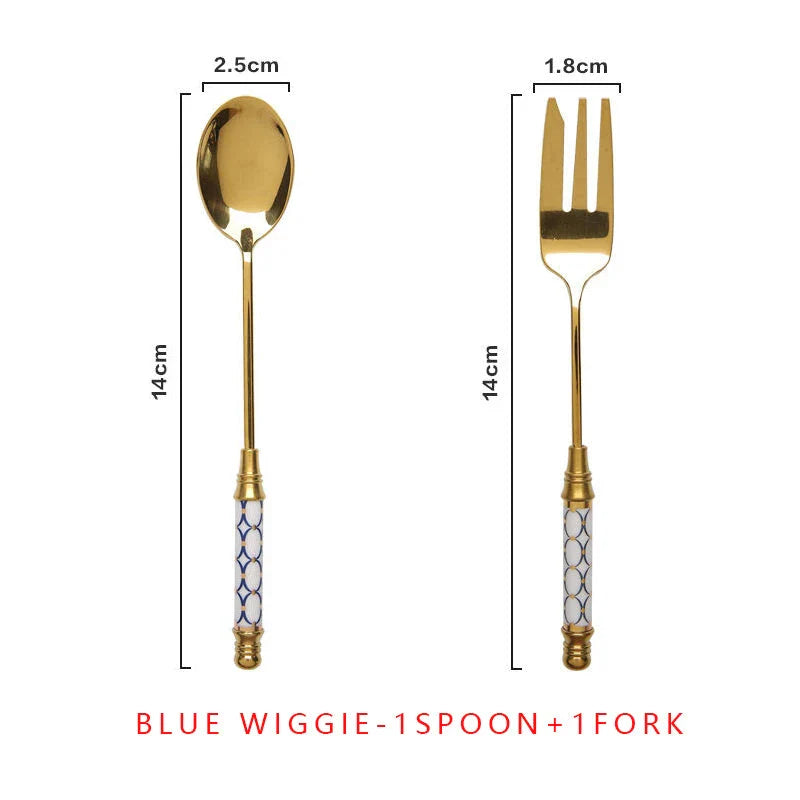 Elegant vintage gold and ceramic coffee and dessert utensil set with hand-painted handles in pink and blue tones
