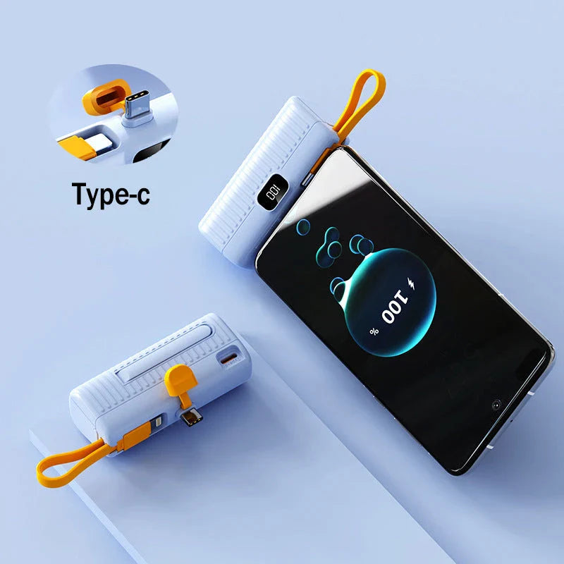 A compact, dual-port 30,000mAh power bank with built-in charging cables and fast charging capabilities.