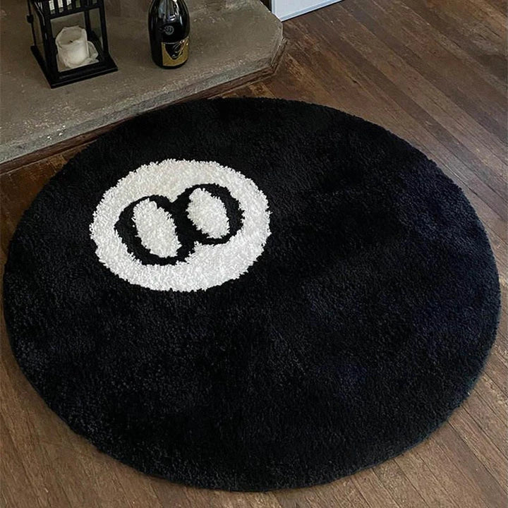 A round, soft rug with a spooky 8 ball design, perfect for adding a unique, eerie accent to any room.