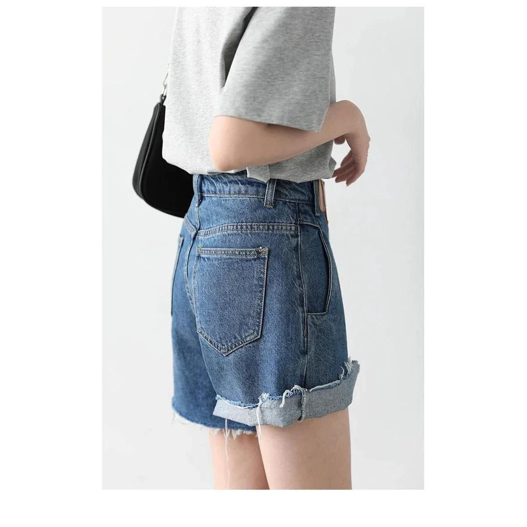 Women's Retro Blue High-Waisted Denim Shorts with Irregularly Cut Design and Cuff Details