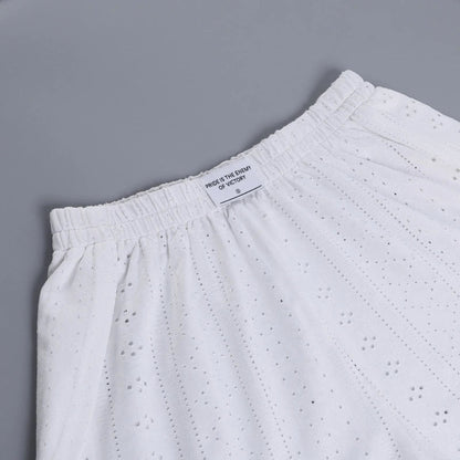 Trendha Women's Long Sleeve Pullover Top and Shorts Set in White, featuring a chic hollow-out design and flattering slim fit