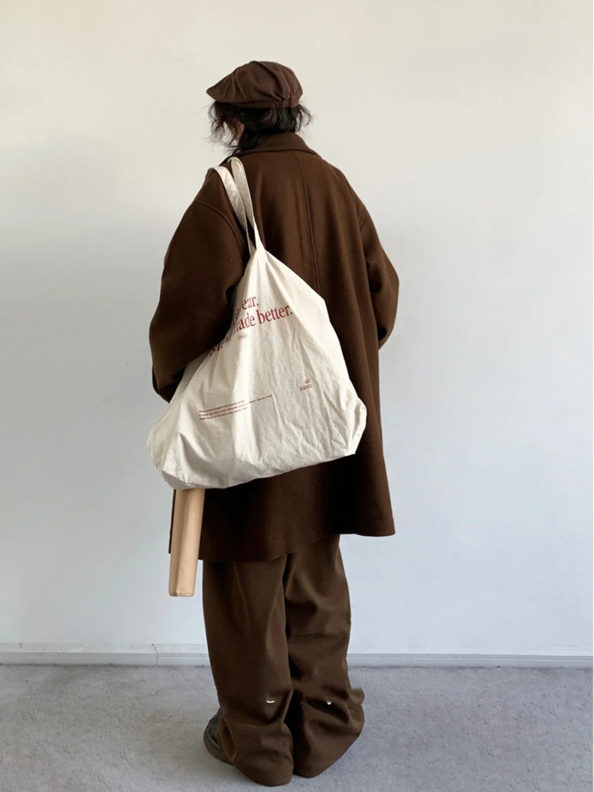 Premium Japanese-inspired retro wool coat in a classic brown color, featuring a single-breasted design and lapel collar for a polished look.