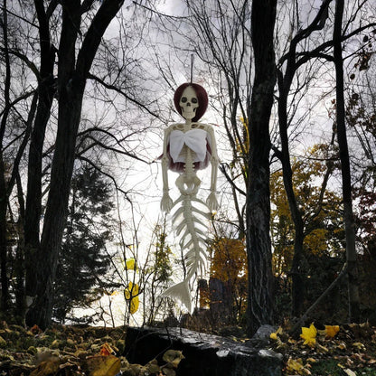 Mermaid bone pendant in various colors, including brown, dark purple, burgundy, and lake blue, hanging outdoors for Halloween decoration
