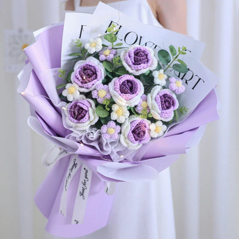 A knitted floral bouquet with vibrant flowers and LED lighting, creating a mesmerizing and elegant home decor piece.