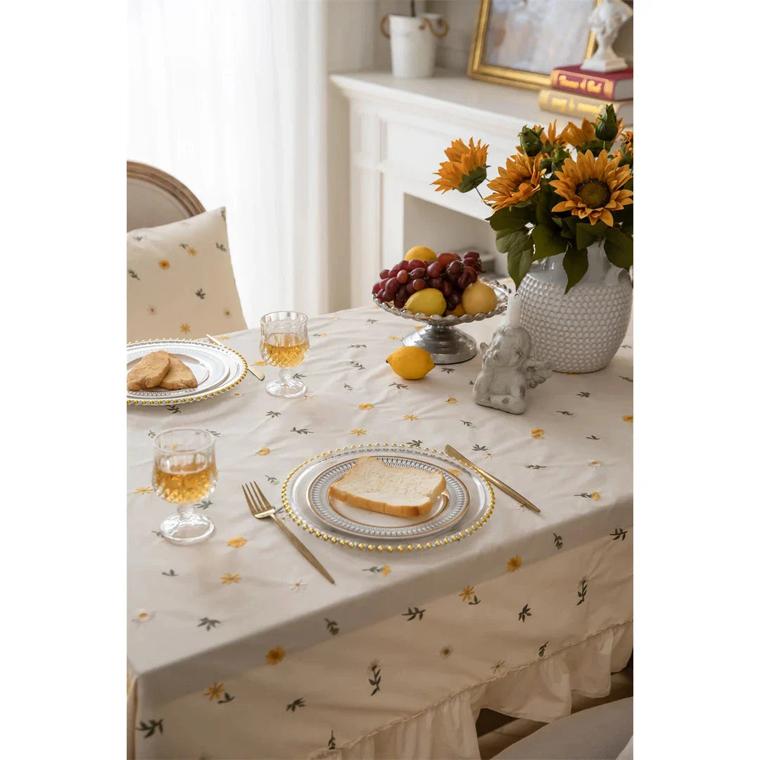 Elegant cotton tablecloth with apricot embroidery and lotus leaf edge, perfect for dining decor
