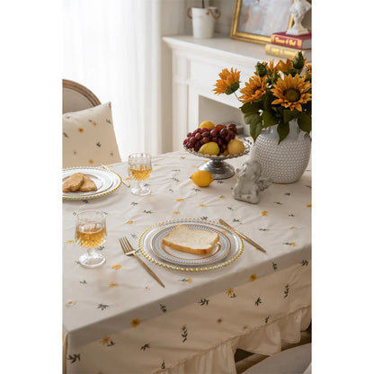 Elegant cotton tablecloth with apricot embroidery and lotus leaf edge, perfect for dining decor