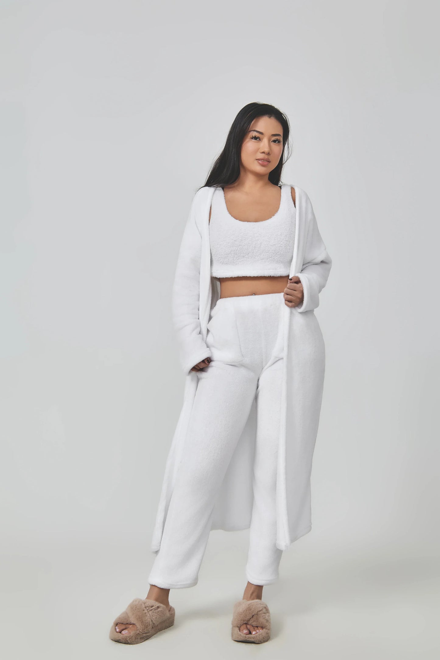 Cozy 3-piece loungewear set in pastel colors including crop top, wide-leg pants, and matching cardigan
