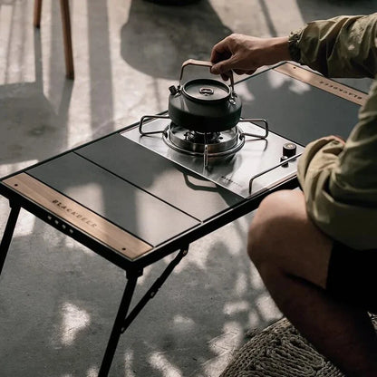 Portable Camping Folding Table with Integrated BBQ Grill made of Aluminum Alloy and Wood, perfect for outdoor adventures and picnics