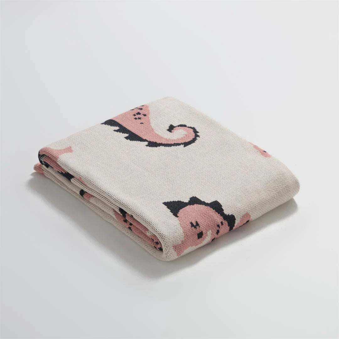 Cozy cotton blanket with cute sea horse design, perfect for relaxation and comfort