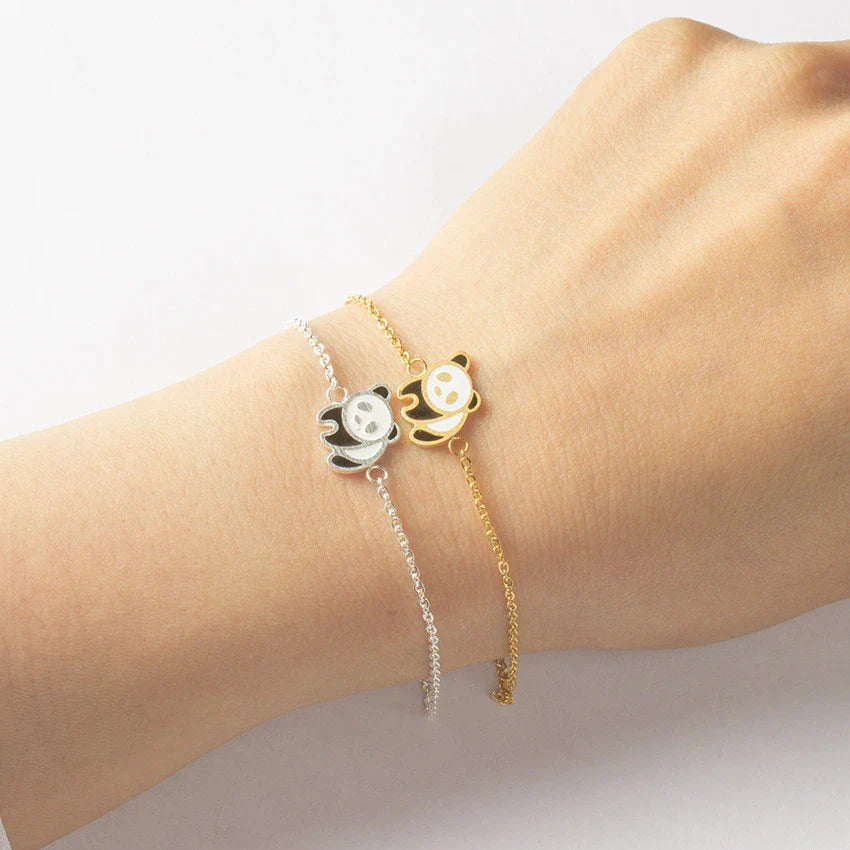 Elegant gold-plated stainless steel bracelet with a delicate panda charm, perfect for fashion-conscious women