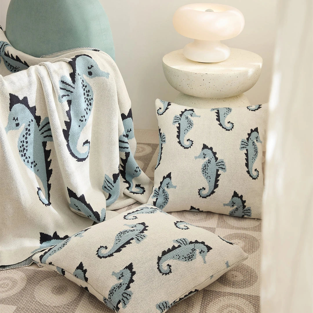 Cozy cotton blanket with cute sea horse design, perfect for relaxation and comfort