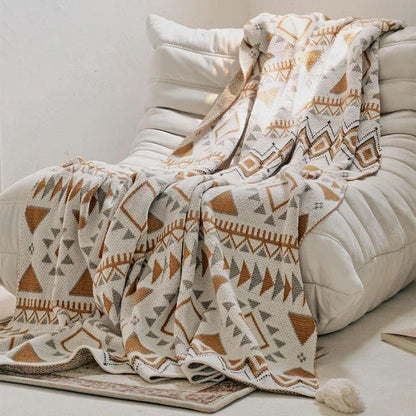 Cozy boho geometric cotton knitted blanket with a soft, breathable design perfect for warm summer nights