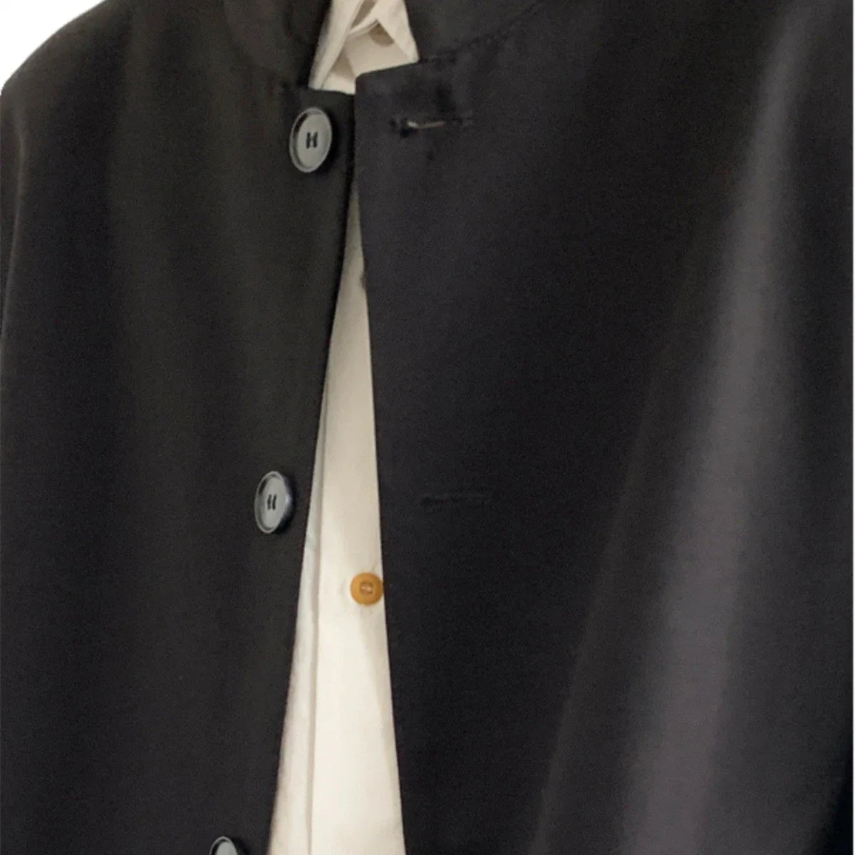Premium casual men's Zhongshan jacket in black with stand collar design, made from durable wool blend material for sophisticated style and comfort.