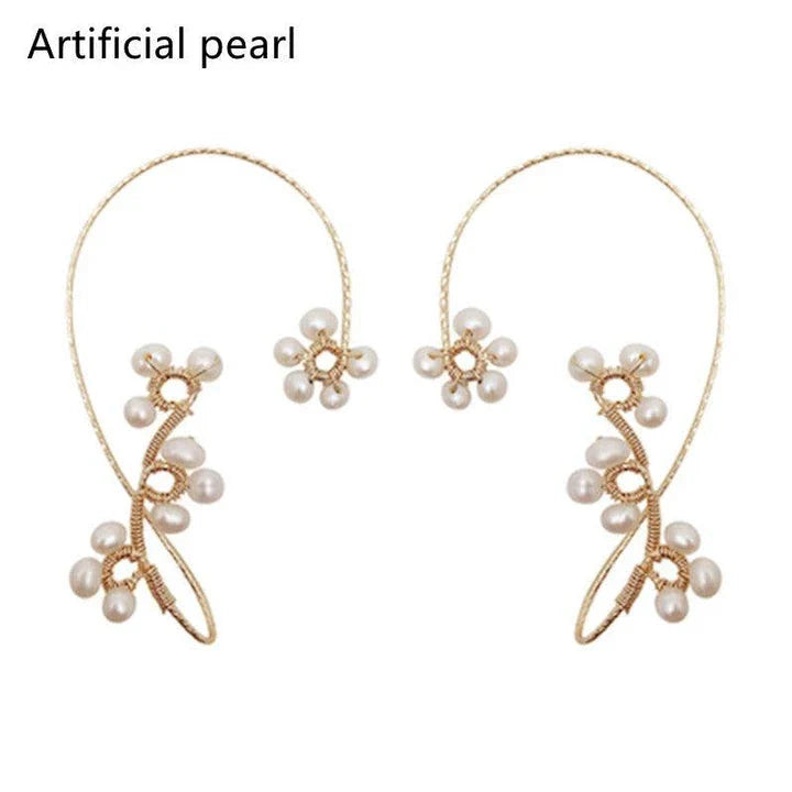 Elegant hand-woven freshwater pearl earrings with a unique geometric design, perfect for adding a touch of sophistication to any outfit.