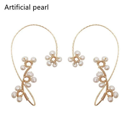 Elegant hand-woven freshwater pearl earrings with a unique geometric design, perfect for adding a touch of sophistication to any outfit.